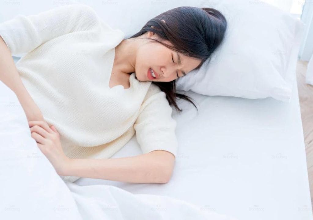 Hình ảnh người phụ nữ bị đau dữ dội