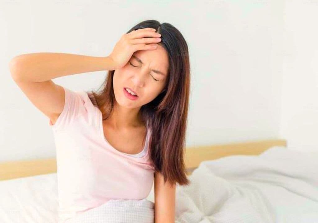 Hình ảnh người phụ nữ đang bị mệt mỏi