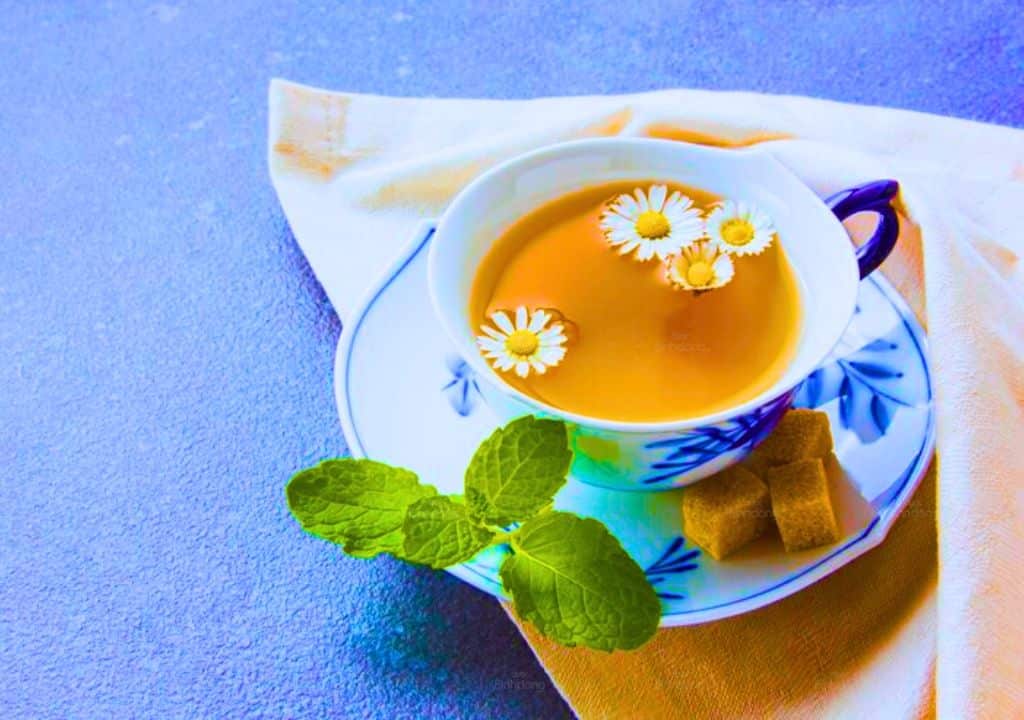 Hình ảnh về trà hoa cúc chữa đau bụng ở phụ nữ