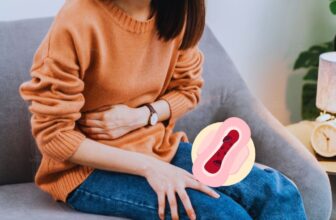 Hình ảnh về người phụ nữ đang bị đau bụng do kinh vón cục