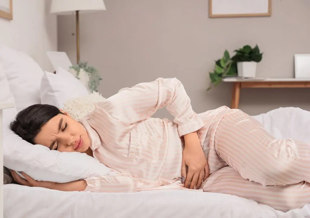 Hình ảnh ngừoi phụ nữ rối loạn kinh nguyệt